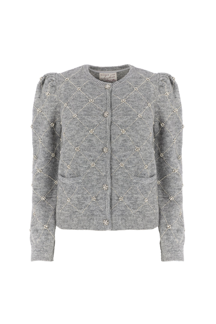 A light grey knit cardigan sweater with decorative embroidered details and puff sleeves, shown against a plain white background.